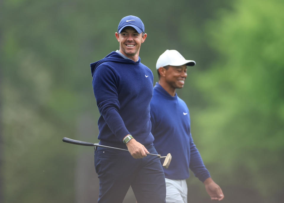 Rory McIlroy and Tiger Woods will be receiving equity for their loyalty to the PGA Tour. (David Cannon/Getty Images)