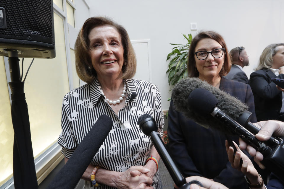 Speaker of the House Nancy Pelosi, D-Calif., left, speaks with media members with Rep. Suzan DelBene, D-Wash., after they spoke about lowering the cost of prescription drug prices Tuesday, Oct. 8, 2019, at Harborview Medical Center in Seattle. (AP Photo/Elaine Thompson)