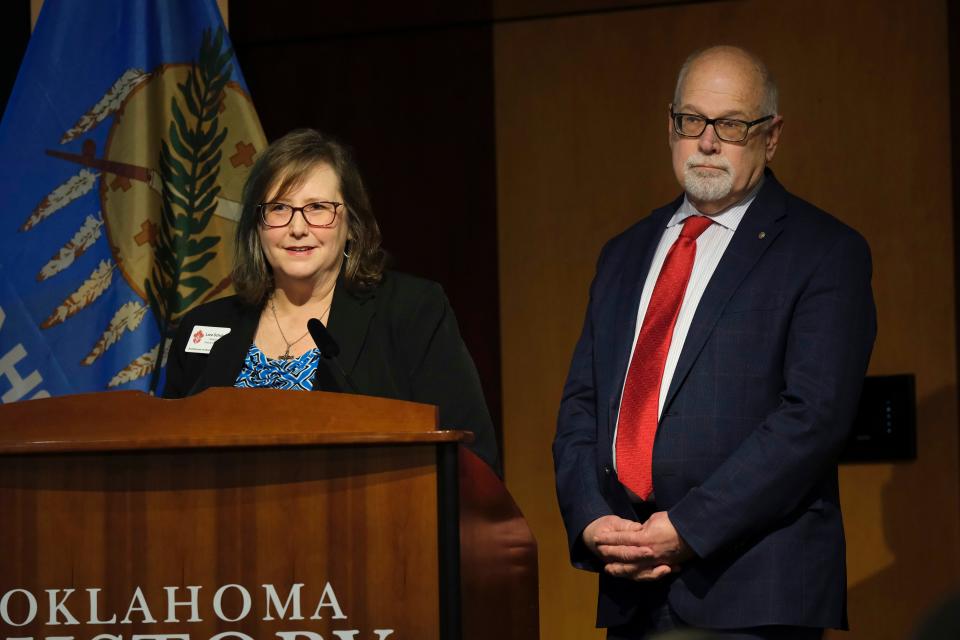 Laura Schuler, senior director for Catholic Education at Archdiocese of Oklahoma City, and Michael Scaperlanda, chancellor for the Archdiocese of Oklahoma City, present a proposal for the nation's first publicly funded Catholic charter school on Tuesday at a meeting of the Oklahoma Statewide Virtual Charter School Board at the Oklahoma History Center.