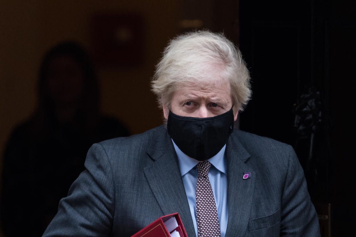 LONDON, UNITED KINGDOM - JANUARY 27, 2021: British Prime Minister Boris Johnson leaves 10 Downing Street for PMQs at the House of Commons on 27 January, 2021 in London, England. With further 1,631 coronavirus deaths recorded yeasterday the official UK Covid-19 death toll stands at 100,162, which is the highest number in Europe.- PHOTOGRAPH BY Wiktor Szymanowicz / Barcroft Studios / Future Publishing (Photo credit should read Wiktor Szymanowicz/Barcroft Media via Getty Images)