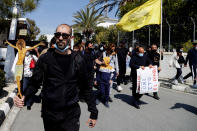 Protestors gather to protest outside Cyprus' national broadcasting building, in capital Nicosia, Cyprus, Saturday, March 6, 2021. The Orthodox Church of Cyprus is calling for the withdrawal of the country’s controversial entry into this year’s Eurovision song context titled “El Diablo”, charging that the song makes an international mockery of country’s moral foundations by advocating “our surrender to the devil and promoting his worship.” (AP Photo/Petros Karadjias)