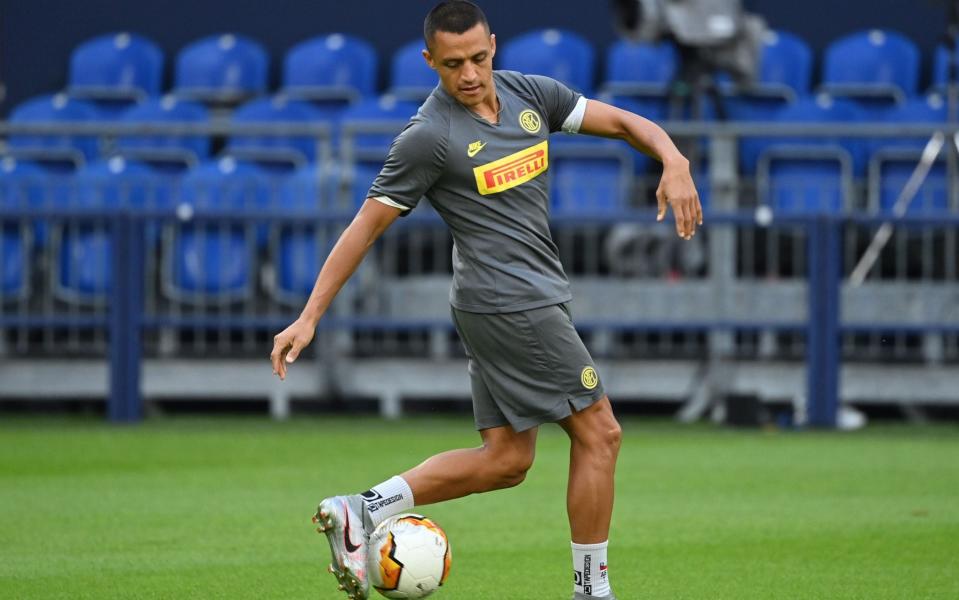  Inter Milan's Alexis Sanchez during a training session at the stadium in Gelsenkirchen - Shutterstock