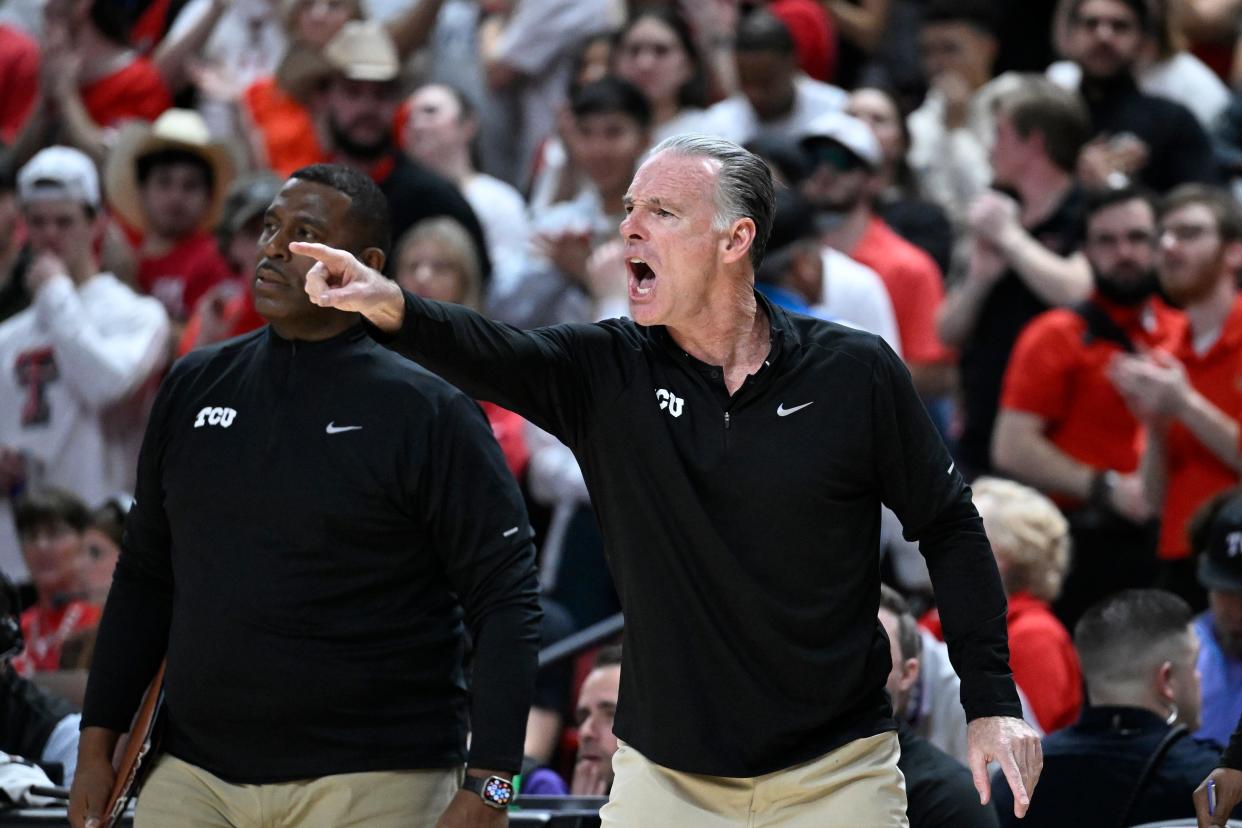 TCU coach Jamie Dixon gives instructions from the sideline during the first half of the team's NCAA college basketball game against Texas Tech on Tuesday, Feb. 20, 2024.