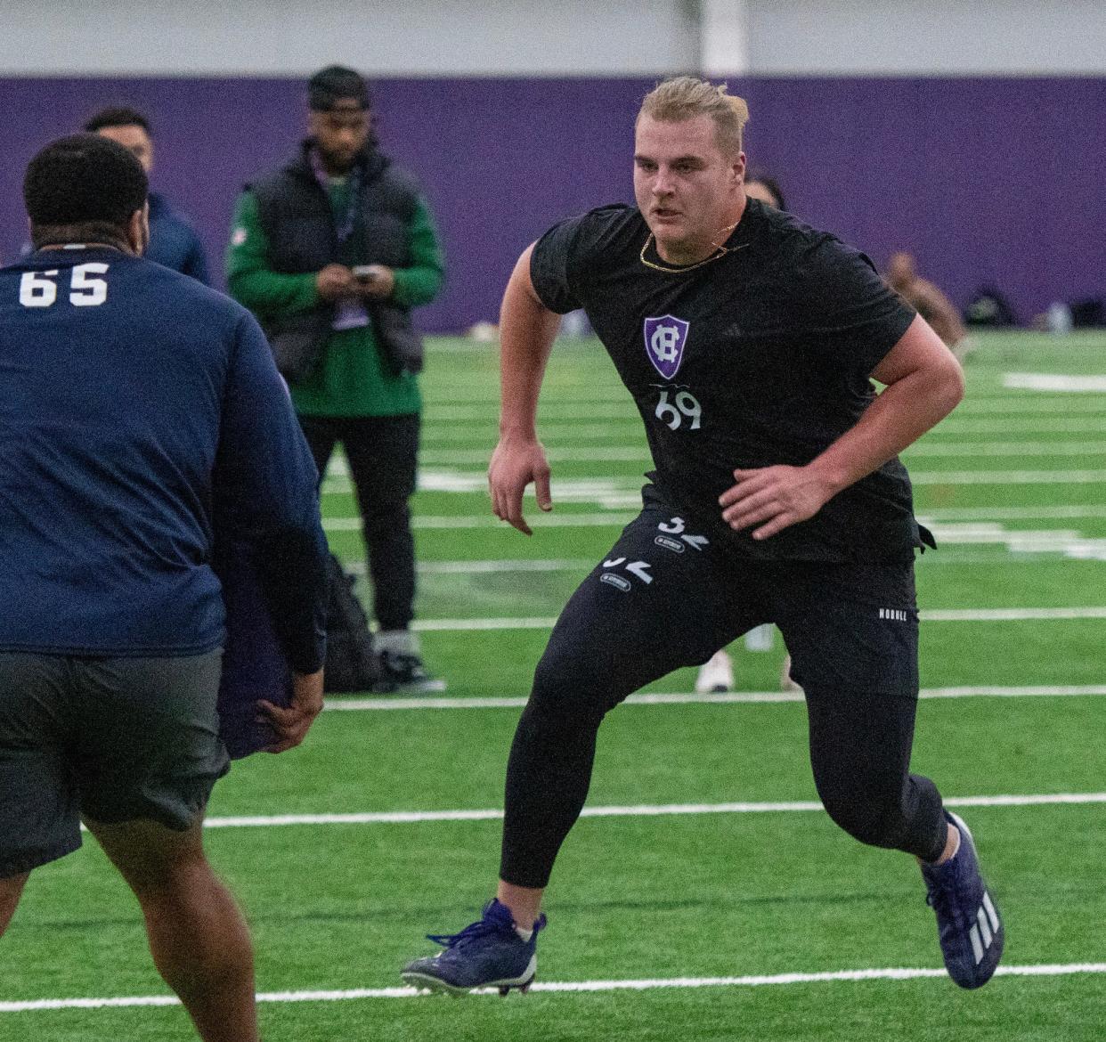 C.J. Hanson runs through drills during NFL Pro Day at Holy Cross in March.