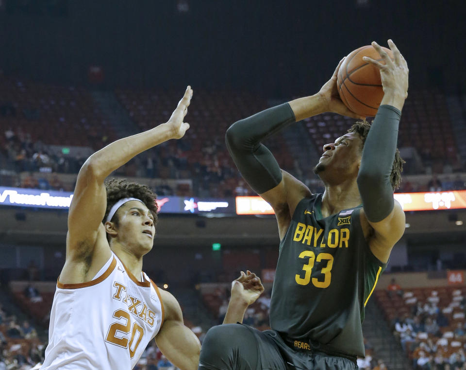 Baylor's Freddie Gillespie shoots over Jericho Sims of the Texas Longhorns on Feb. 10. (Chris Covatta/Getty Images)