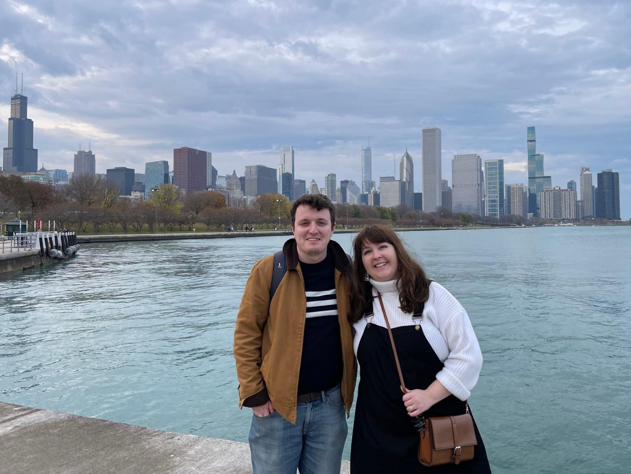 clom and alexis posing in front of lake michigan and the chicago skyline