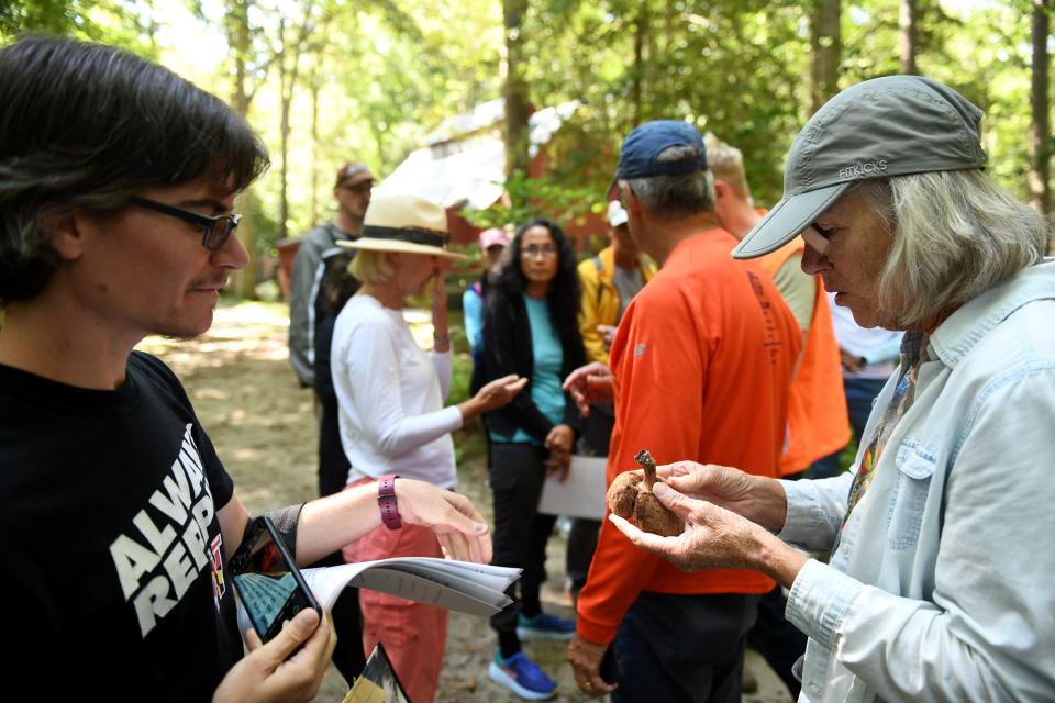 Mushrroms found are passed around during a Goat Plum Tree Farm mushroom foraging class Saturday, Sept. 2, 2023, in Berlin, Maryland.