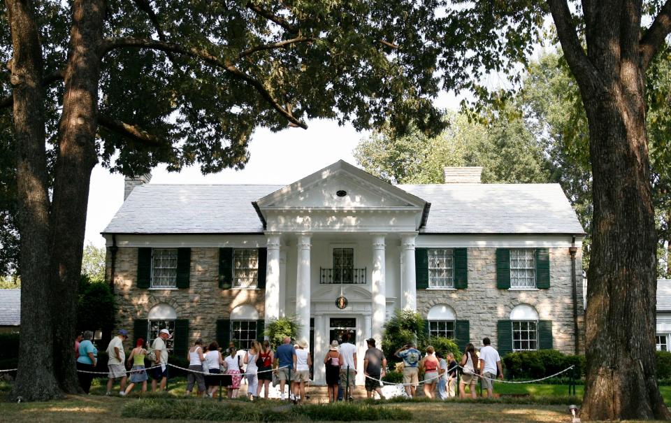 Elvis fans tour the Graceland mansion in Memphis on Aug. 15, 2007.