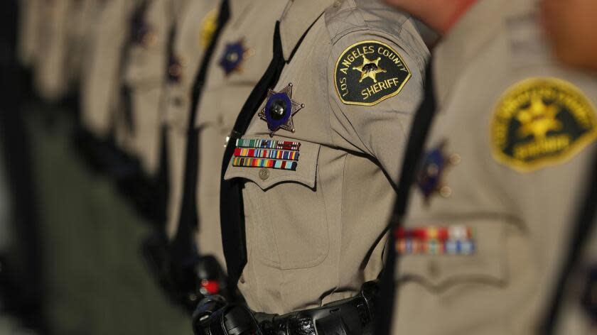 LOS ANGELES, CA-OCTOBER 27, 2017: Los Angeles County Sheriff's deputies stand at attention during the inspection portion of their graduation ceremony at the Biscailuz Training Center of the Los Angeles County Sheriff's Dept. in East Los Angeles on October 27, 2017. (Mel Melcon/Los Angeles Times)