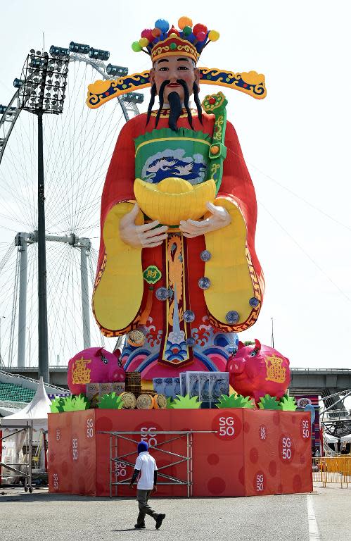 A God of Fortune statue displayed as part of Chinese Lunar New Year decorations in Singapore on February 12, 2015