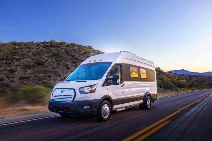 Winnebago Industries' e-RV being driven on the road.