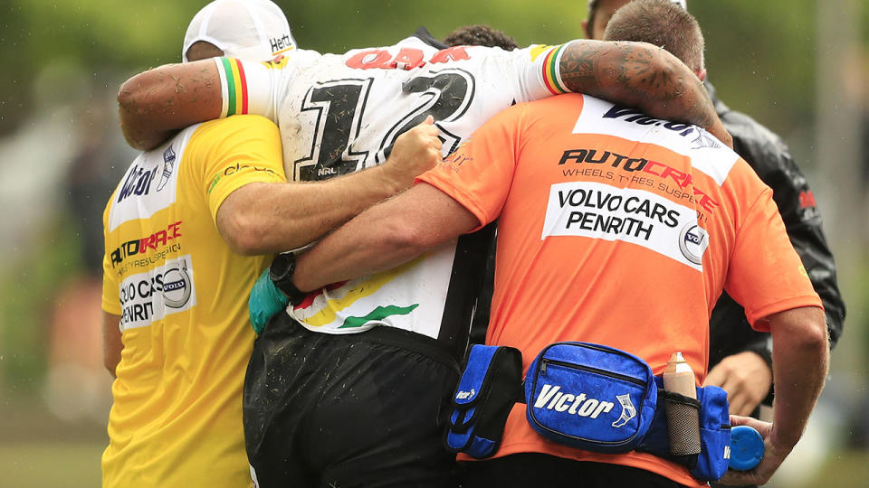 Viliame Kikau goes off injured. (Photo by Mark Evans/Getty Images)