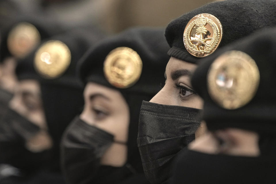 Saudi policewomen attend the Hajj security press conference at 911 headquarters in Mecca, Saudi Arabia, Friday, June 23, 2023. Muslim pilgrims are converging on Saudi Arabia's holy city of Mecca for the largest hajj since the coronavirus pandemic severely curtailed access to one of Islam's five pillars. (AP Photo/Amr Nabil)