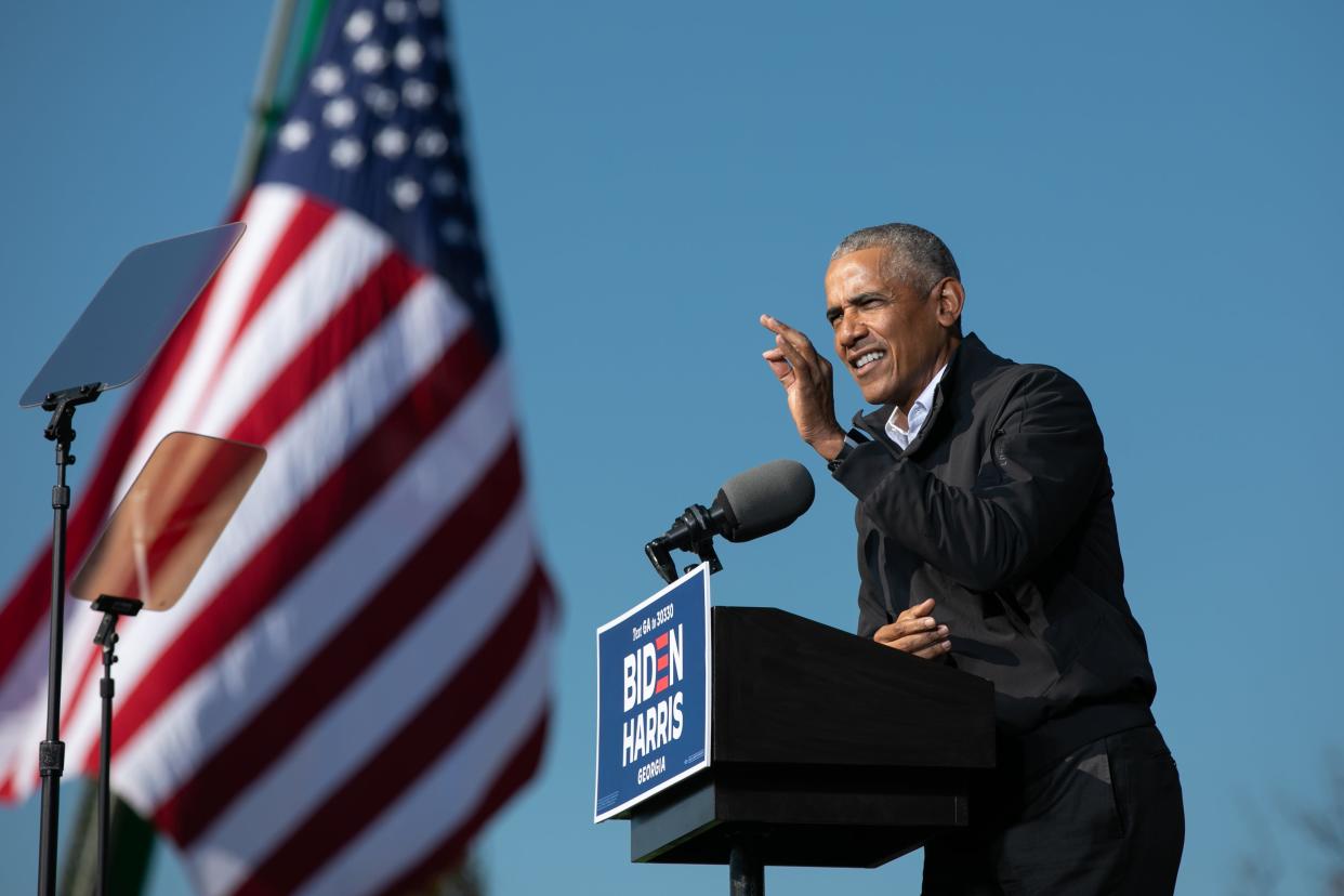 <p>Barack Obama appeared at a rally for Joe Biden and Democratic senate candidates in Georgia on 2 November.</p> (Getty Images)