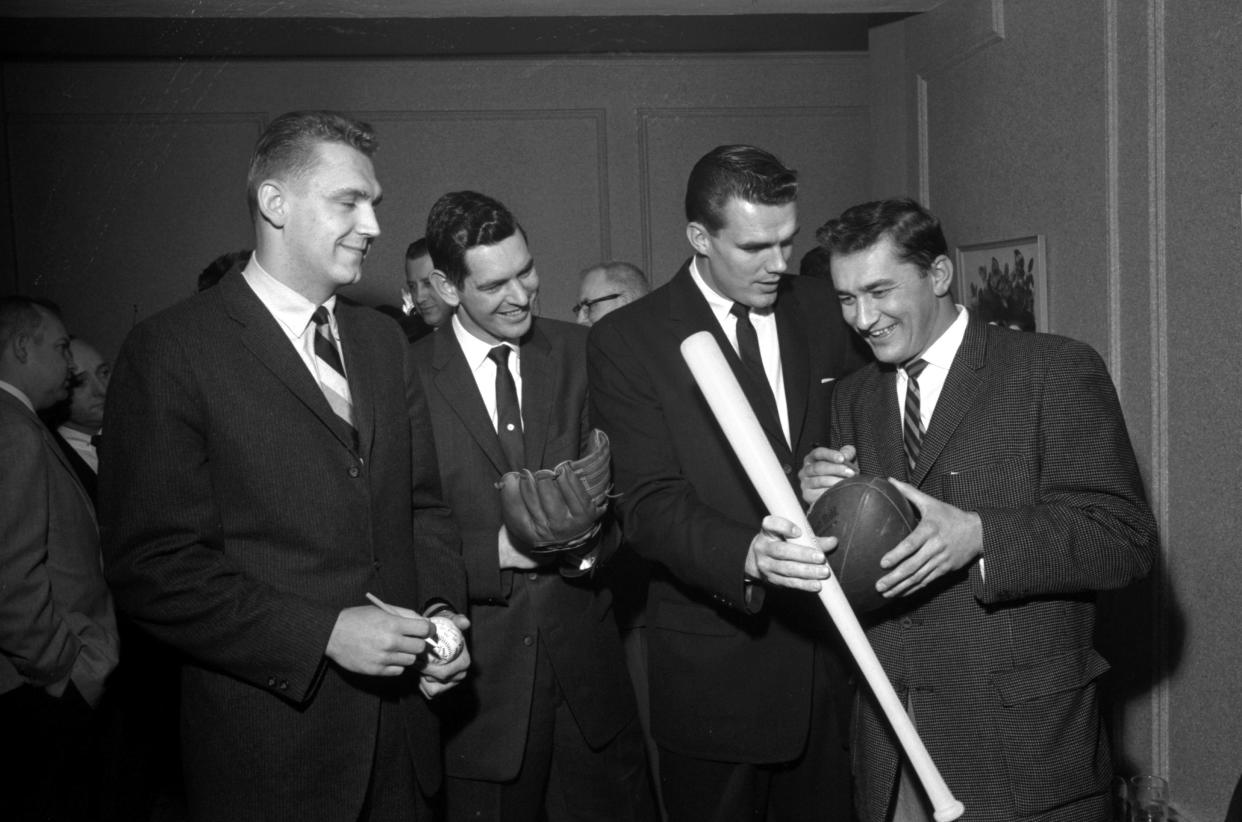 Dale Hackbart, Johnny Klippstein, Gary Knafelc and Johnny Logan are seen during the inaugural Green Bay Baseball Night  on Jan. 22, 1960, at the Hotel Northland in Green Bay. Klippstein pitched for the Los Angeles Dodgers in the 1959 World Series, while Logan, a shortstop for the Milwaukee Braves from 1953-60, played in the 1957 and 1958 World Series. Knafelc played for the Green Bay Packers from 1954-62 and Klippstein from 1960-61.