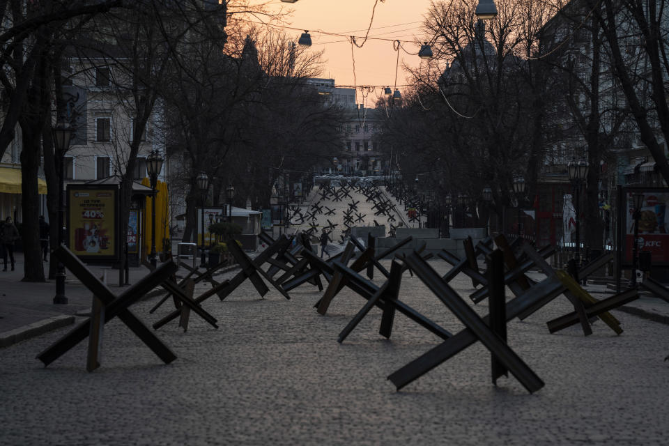 Anti- tank barricades are placed on a street as preparation for a possible Russian offensive, in Odesa, Ukraine, Thursday March 24, 2022.(AP Photo/Petros Giannakouris)