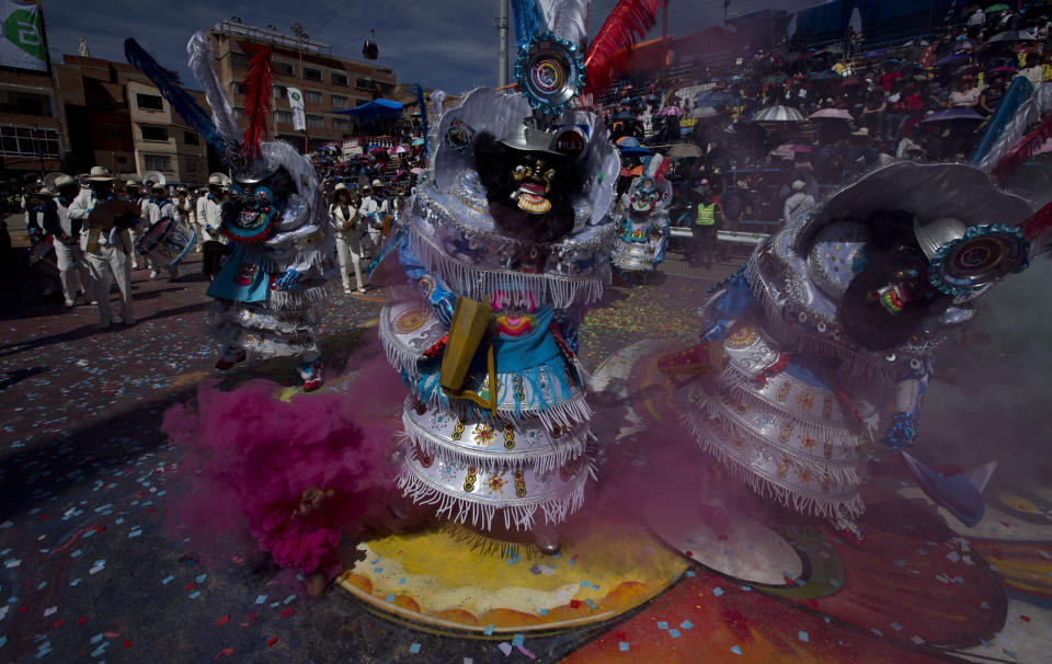 Traditional "Morenada" dancers perform during the Carnival, in Oruro, Bolivia, Saturday, March 2, 2019. The unique festival features spectacular folk dances, extravagant costumes, beautiful crafts, lively music, and up to 20 hours of continuous partying with lots of tourists, drawing crowds of up people annually. (AP Photo/Juan Karita)