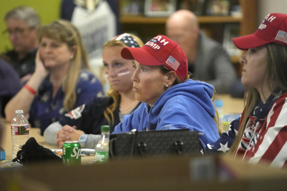 Jenny Willis, center, looks on during the Republican caucus at Millcreek Junior High School Tuesday, March 5, 2024, in Bountiful, Utah. (AP Photo/Rick Bowmer)