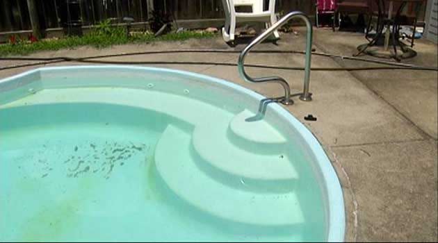Mr Amaral's Tennessee pool where a woman swam naked to distract him while her husband burgled his home. Photo: Youtube