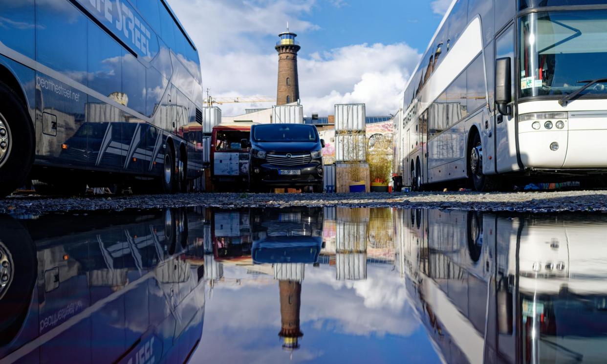 <span>Tour buses and vans in Cologne, Germany. Bookings for British artists at EU-based festivals are down by a third on pre-Brexit levels. </span><span>Photograph: Gerd Harder/Alamy</span>