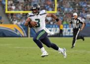 Aug 18, 2018; Carson, CA, USA; Seattle Seahawks quarterback Russell Wilson (3) carries the ball against the Los Angeles Chargers during a preseason game at StubHub Center.The Chargers defeated the Seahawks 24-14. Mandatory Credit: Kirby Lee-USA TODAY Sports