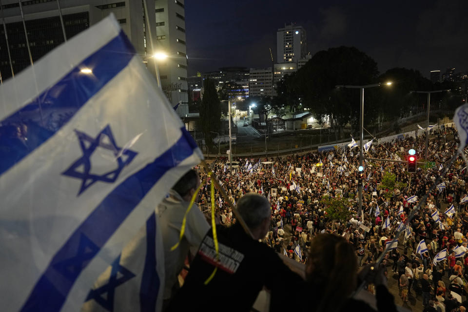 Relatives and supporters of the Israeli hostages held in the Gaza Strip by the Hamas militant group call for their release during a protest in Tel Aviv, Monday, April 29, 2024. (AP Photo/Ohad Zwigenberg)