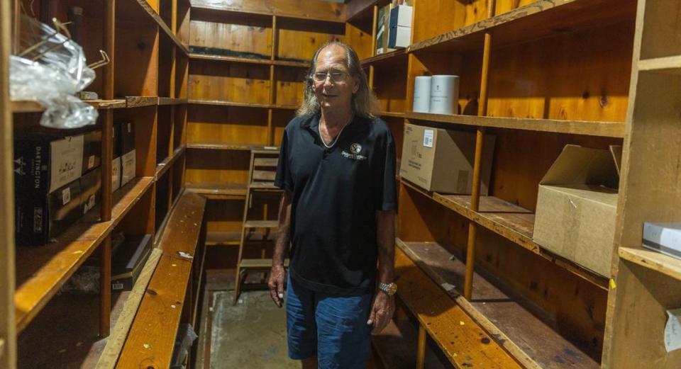 Original owner Larry Solomon stands in the original space where liquors were sold at the landmark family business Sunset Corners located at 8701 Sunset Dr, in Miami, on Saturday, June 01, 2024.