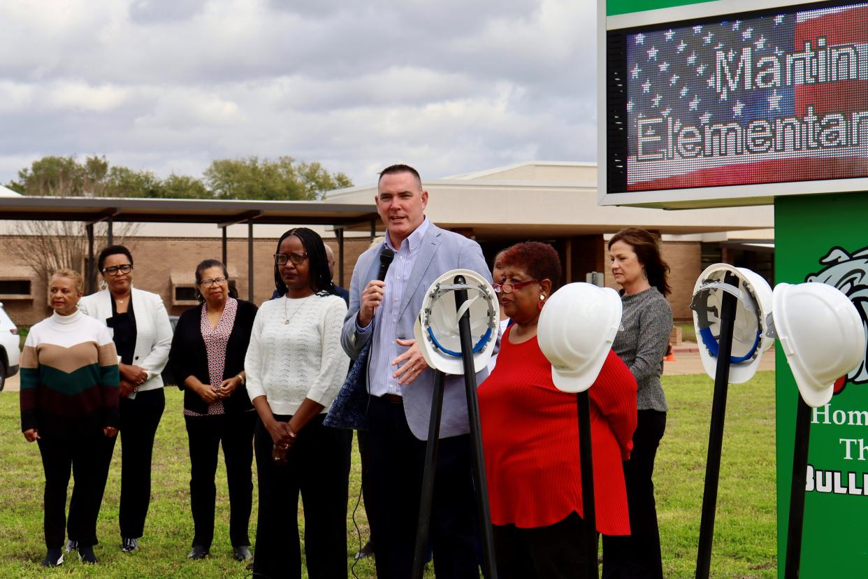 Rapides Parish Schools Superintendent Jeff Powell (center) talks about District 62 bond projects Thursday at Martin Park Elementary School. With him is Rapides Parish School Board member Linda Burgess (right) and Principal Tracy Vorrice (left).