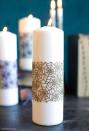 <p>This delicate design can complement your existing candles for a festive and practically free addition to your Halloween decor.</p><p><strong>Get the tutorial at <a href="https://go.redirectingat.com?id=74968X1596630&url=https%3A%2F%2Fliagriffith.com%2Fspiderweb-candle-wrap%2F&sref=https%3A%2F%2Fwww.countryliving.com%2Fdiy-crafts%2Fg22221887%2Fhalloween-candles%2F" rel="nofollow noopener" target="_blank" data-ylk="slk:Lia Griffith;elm:context_link;itc:0;sec:content-canvas" class="link ">Lia Griffith</a>.</strong></p><p><a class="link " href="https://www.amazon.com/Assorted-Metallic-Paper-Compatible-Aquamarine/dp/B06XRFVBTJ?tag=syn-yahoo-20&ascsubtag=%5Bartid%7C10050.g.22221887%5Bsrc%7Cyahoo-us" rel="nofollow noopener" target="_blank" data-ylk="slk:SHOP METALLIC PAPER;elm:context_link;itc:0;sec:content-canvas">SHOP METALLIC PAPER</a><br></p>