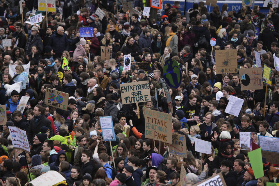 Students attend a protest rally of the 'Friday For Future Movement in Berlin, Germany, Friday, March 29, 2019. Thousands of students are gathering in the German capital, skipping school to take part in a rally demanding action against climate change.(AP Photo/Markus Schreiber)