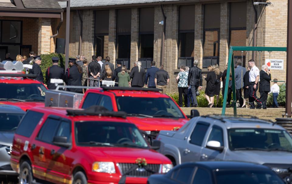 Funeral attendees make their way into Cabot United Methodist Church in Winfield Township Friday, July 19th for the funeral of Corey Comperatore the Buffalo Township man killed at SaturdayÕs rally for former President Donald Trump from a would-be assigns stray bullet. Kevin Whitlock / Massillon Independent Kevin Whitlock / Massillon Independent