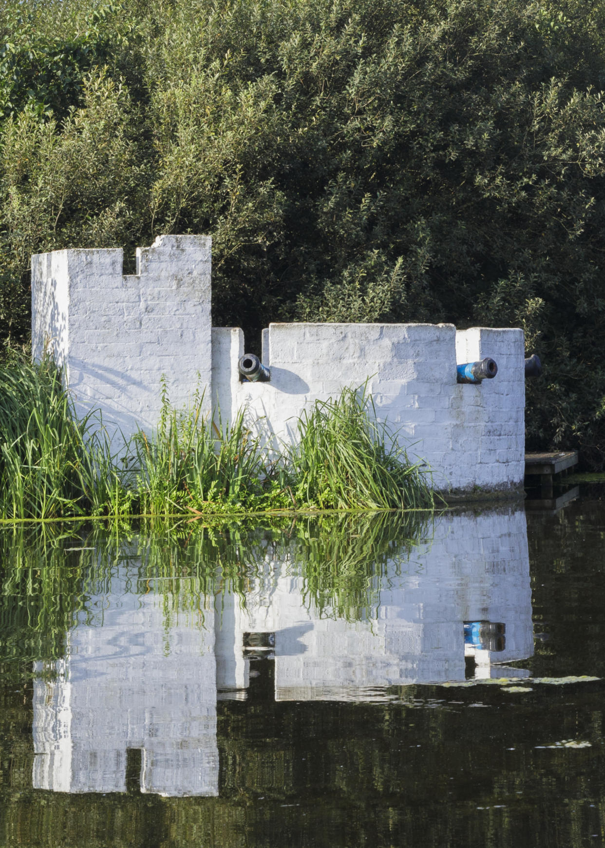 Some of the artificial islands at Thorpeness Meare have small buildings on them, like The Fort. (Historic England Archive/ PA)