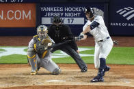 New York Yankees' Giancarlo Stanton hits a single during the seventh inning of a baseball game, Wednesday, April 24, 2024, in New York. (AP Photo/Frank Franklin II)