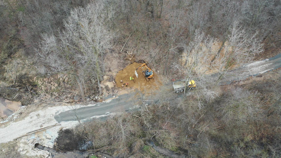 Crews work to repair a water main break on March 18, 2024, that led to a widespread boil water advisory in Grand Rapids.