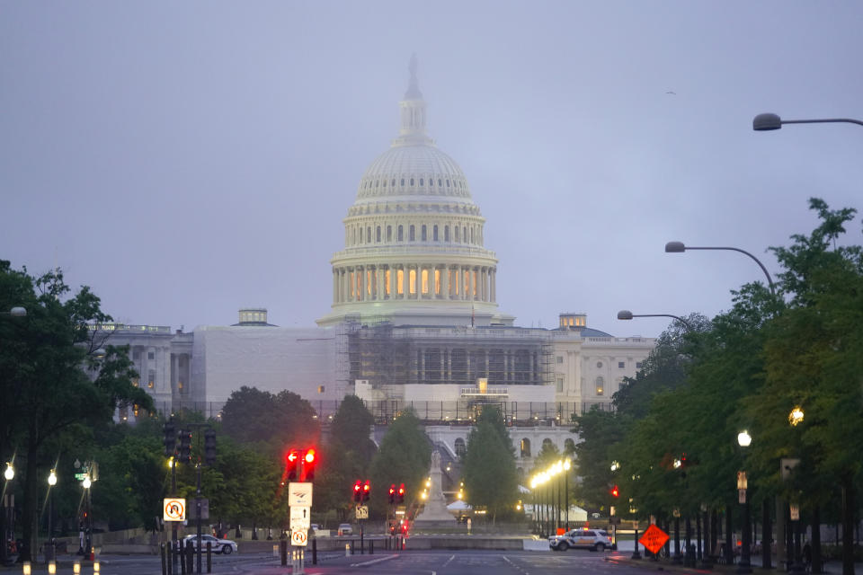 Morning fog begins to lift around the US Capitol in Washington, Saturday, May 14, 2022. (Photo/Pablo Martinez Monsivais)