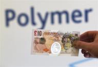 A sample polymer ten GB pound banknote is seen on display at the Bank of England in London September 10, 2013. REUTERS/Chris Ratcliffe/pool