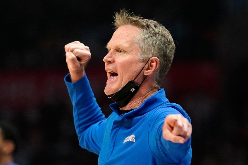 Golden State Warriors head coach Steve Kerr gestures to his team during the first half of an NBA basketball game Monday, Feb. 14, 2022, in Los Angeles. (AP Photo/Mark J. Terrill)