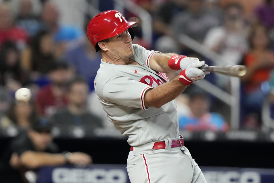 Philadelphia Phillies' J.T. Realmuto strikes out swinging during the fourth inning of a baseball game against the Miami Marlins, Sunday, July 9, 2023, in Miami. (AP Photo/Lynne Sladky)