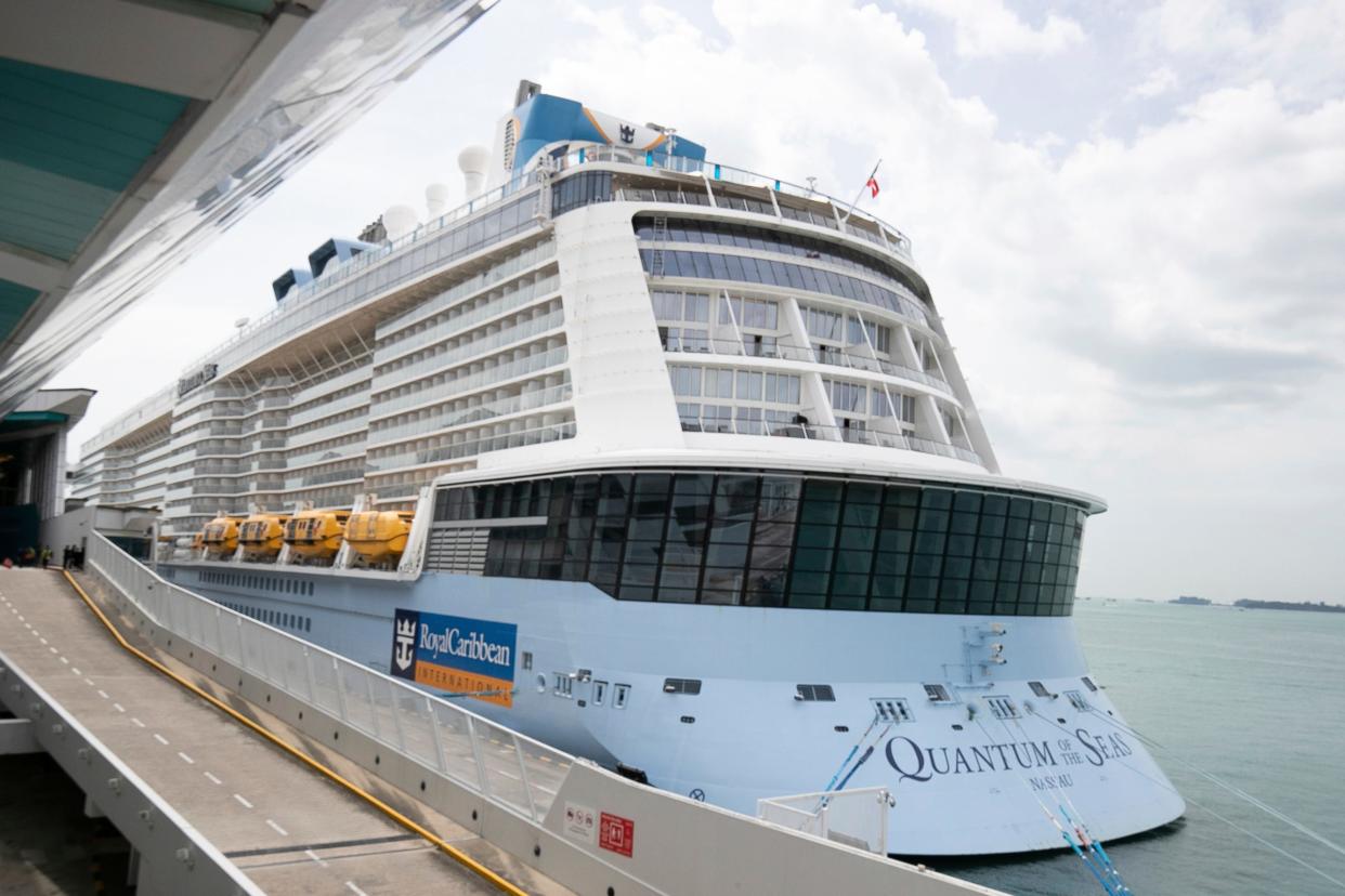 The Quantum of the Seas cruise ship is docked at the Marina Bay Cruise Center Wednesday, Dec. 9, 2020 in Singapore.