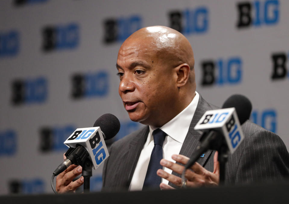 FILE - In this March 12, 2020, file photo, Big Ten Commissioner Kevin Warren addresses the media in Indianapolis after it was announced that the remainder of the Big Ten Conference men's basketball tournament had been canceled. Warren, the first black commissioner of a Power Five conference, is creating a coalition to give the league's athletes a platform to voice their concerns about racism. Warren announced Monday, June 1, 2020, the formation of the Big Ten Anti-Hate and Anti-Racism Coalition, with athletes, coaches, athletic director and university chancellors and presidents. (AP Photo/Michael Conroy, File)