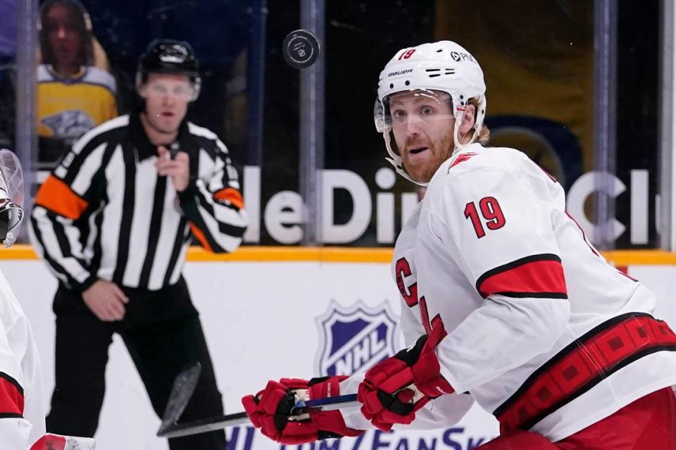 Carolina Hurricanes defenseman Dougie Hamilton (19) follows the bouncing puck in the second period of an NHL hockey game against the Nashville Predators Tuesday, March 2, 2021, in Nashville, Tenn. (AP Photo/Mark Humphrey)