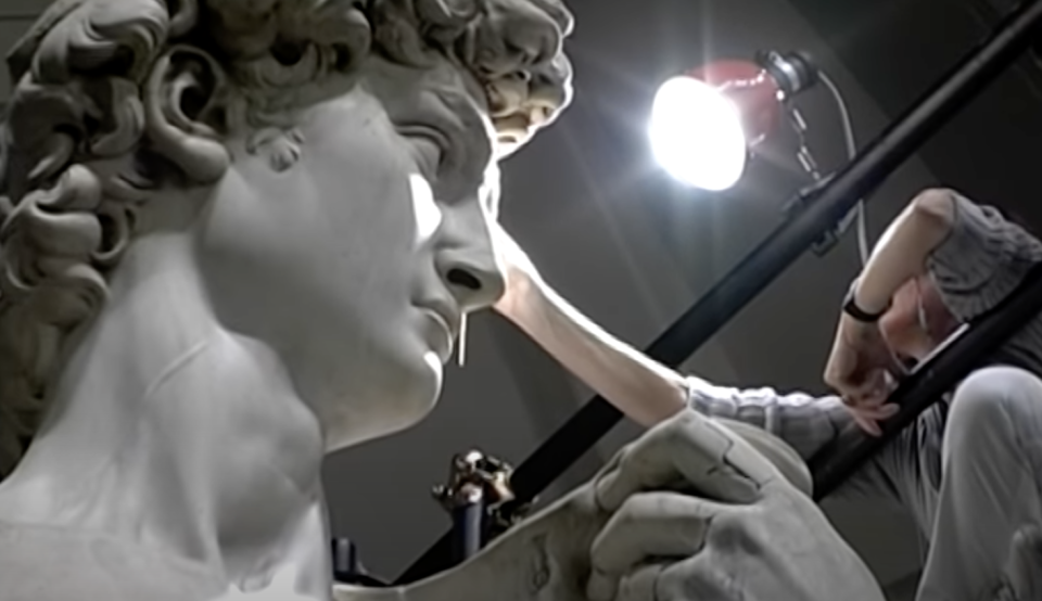 Someone working on Michelangelo's "David"