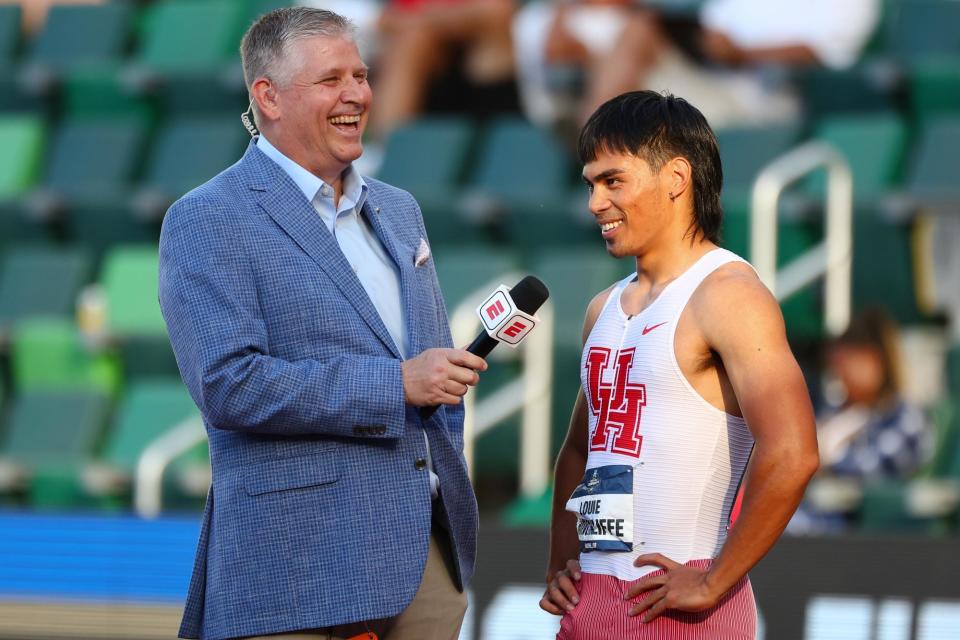 <span>Louie Hinchliffe of the Houston Cougars (right) after his 100m victory in Oregon.</span><span>Photograph: C Morgan Engel/NCAA Photos/Getty Images</span>