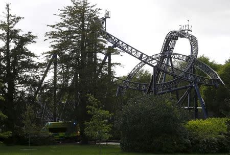 An ambulance drives past the Smiler ride at Alton Towers in Alton, Britain June 2, 2015. REUTERS/Darren Staples