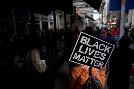 Interfaith clergy leaders march from the Center City Starbucks, where two black men were arrested, to other nearby stores in Philadelphia, Pennsylvania U.S. April 16, 2018. REUTERS/Mark Makela