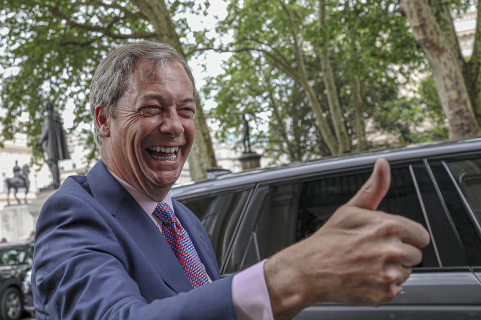 Brexit Party leader Nigel Farage arrives at the party's HQ, prior to an event to mark the gains his party made in the European Elections, in London, Monday, May 27, 2019. In results announced Monday for all regions of the U.K. except Northern Ireland, the Brexit Party had won 29 of the 73 British EU seats up for grabs and almost a third of the votes. (AP Photo/Vudi Xhymshiti)