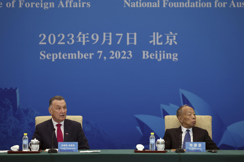 Australia's former Trade Minister Craig Emerson, left, and China's former Foreign Minister Li Zhaoxing attend the 7th China-Australia High Level Dialogue at the Diaoyutai State Guesthouse in Beijing Thursday, Sept. 7, 2023. (Florence Lo/Pool Photo via AP)