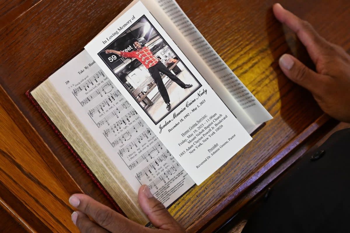 The program at Jordan Neely’s funeral service on Friday which included a picture of him performing as a Michael Jackson impersonator (AFP via Getty Images)