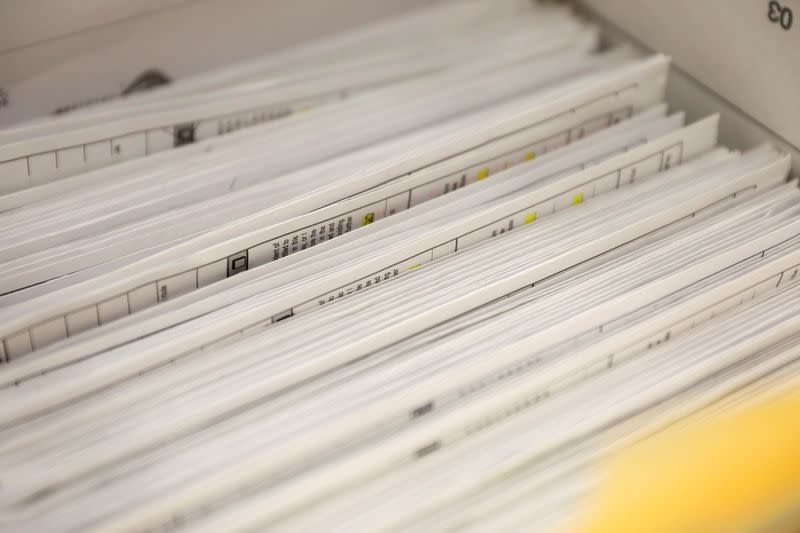 Absentee ballots are counted during the presidential primary election in Wisconsin