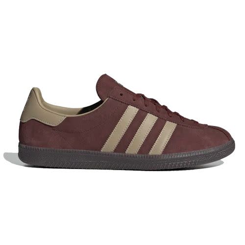 <p><a class="link " href="https://www.adidas.co.uk/buckeye-shoes/GX6931.html" rel="nofollow noopener" target="_blank" data-ylk="slk:SHOP;elm:context_link;itc:0;sec:content-canvas">SHOP</a></p><p>Adidas pays tribute to Ohio (the Midwestern region colloquially known as the Buckeye state) with a striped shoe coloured like a conker, and embellished with one too. </p><p>£90; <a href="https://www.adidas.co.uk/buckeye-shoes/GX6931.html" rel="nofollow noopener" target="_blank" data-ylk="slk:adidas.co.uk;elm:context_link;itc:0;sec:content-canvas" class="link ">adidas.co.uk</a></p>